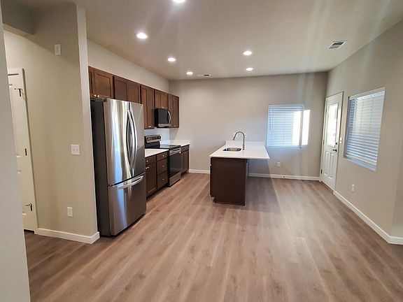 Kitchen with premium stainless steel appliances and quartz countertops