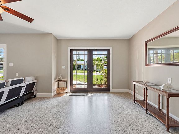 Lots of lighting in entry way / living area.