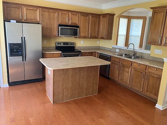 Kitchen has plenty of storage cabinets