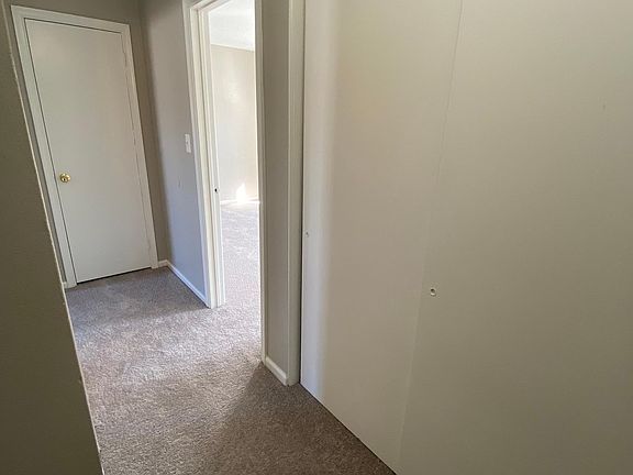 2nd floor hallway with mutiple storage points