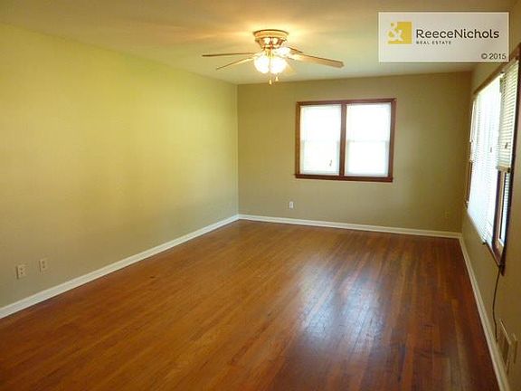 Large living room with wood floors