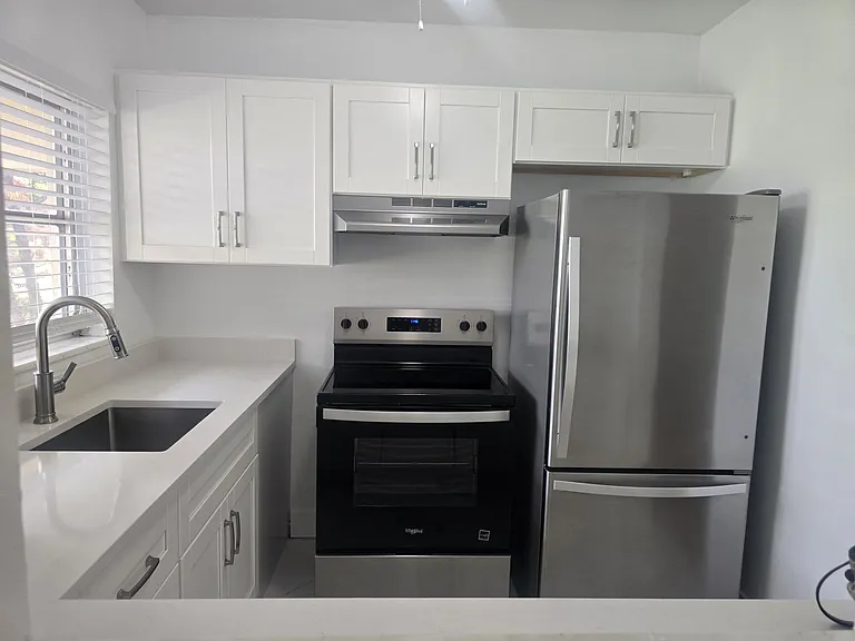 3030 NW 43rd Ter #102 — Photo 11