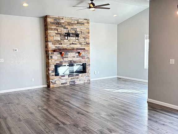 The living room, dining room and kitchen are 1 large open space.