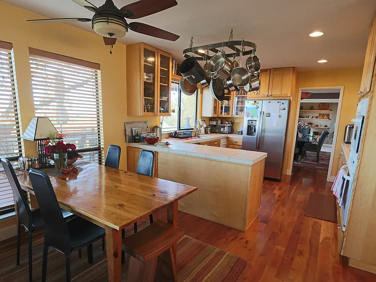 Kitchen and eat-in area, hardwood floors