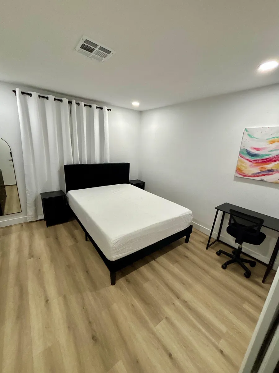 Queen bed with two nightstands that have drawers - Battle Creek Cir