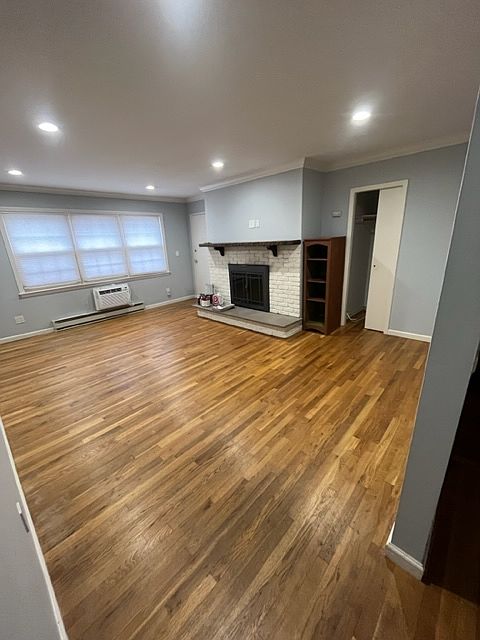 Living Room Area with Wood Burning Fireplace