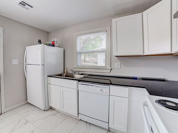 2nd image of 6938 E 10th St #6940