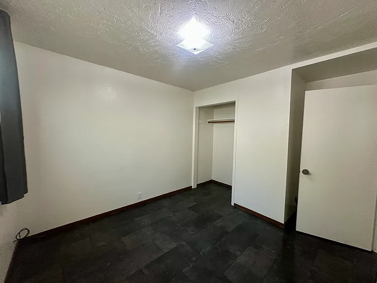 Large bedroom with new flooring
