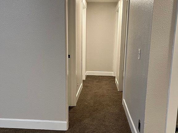 Hallway to bedrooms and main bathroom