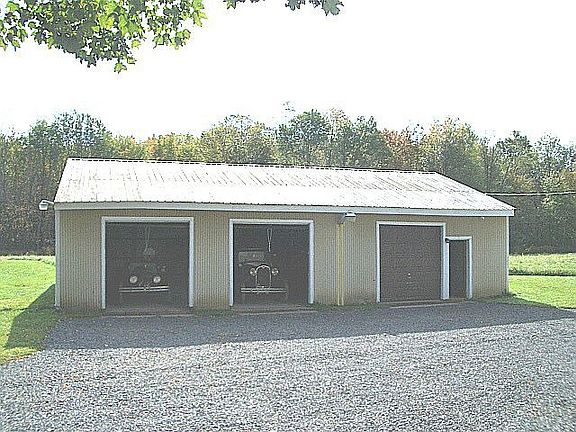 Larger of 2 storage buildings, 36 x 48