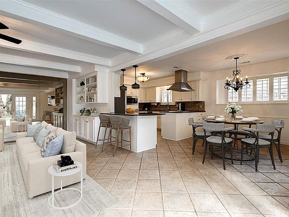 This virtually staged rendering of the family and breakfast areas gives us an idea of how this great space could be used.