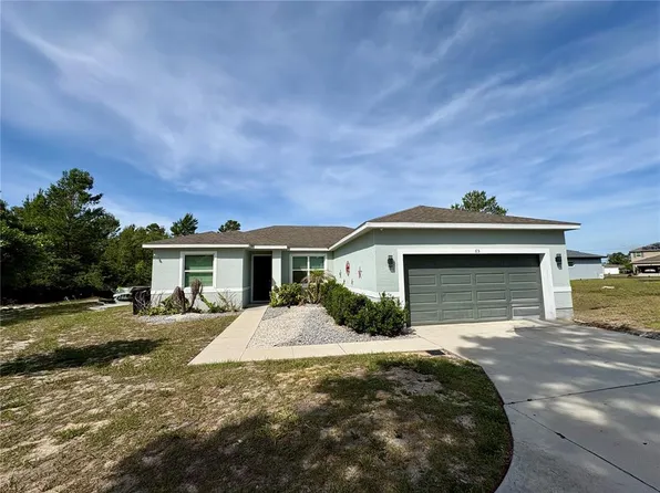 65 Zinnia Ln E, Poinciana, FL 34759