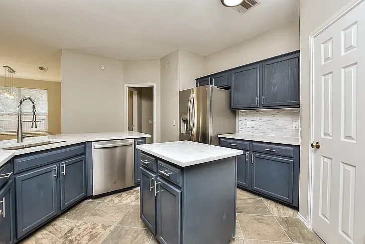 Kitchen to master bedroom door and breakfast nook