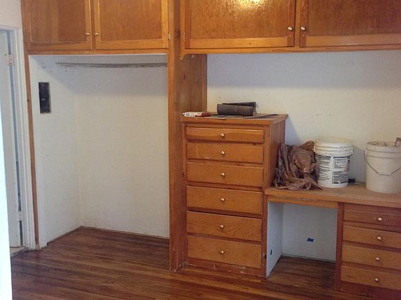 Bedroom with lots of built in storage