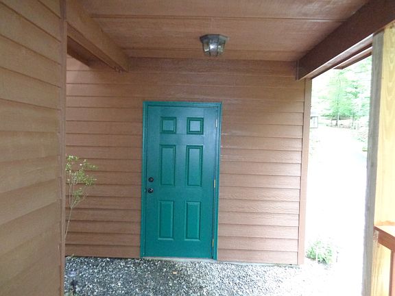 Garage door under roof