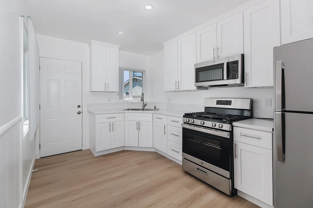 Renovated Kitchen with brand new cabinets, and appliances. - 268 E Providencia Ave #C