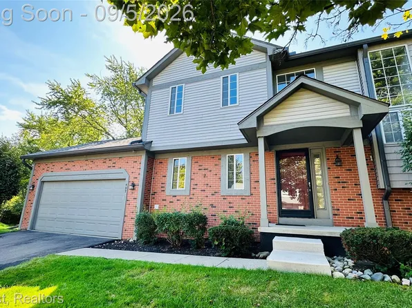 597 Winwood Cir, Walled Lake, MI 48390
