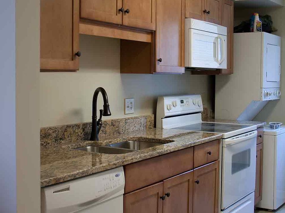 Updated kitchen with new cabinets, granite tops and washer/d