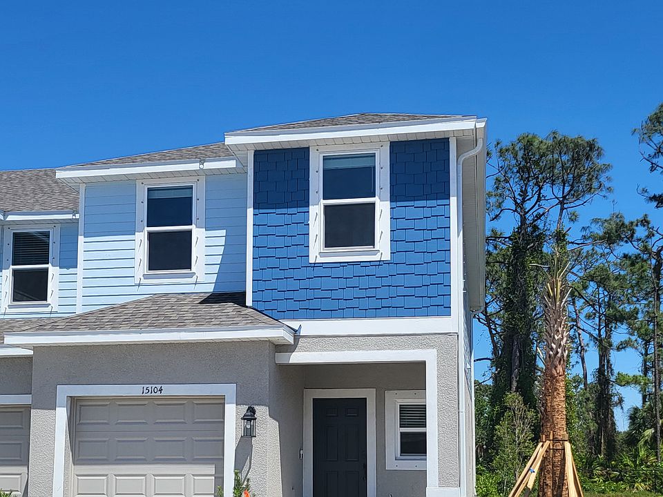 Private corner unit with open views on all sides and scenic views of the Legacy Trail right behind the home.
