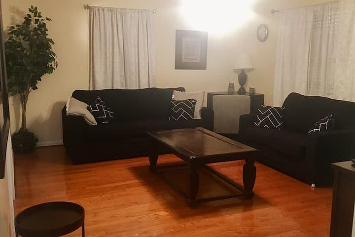 Living room with desk and coffee table