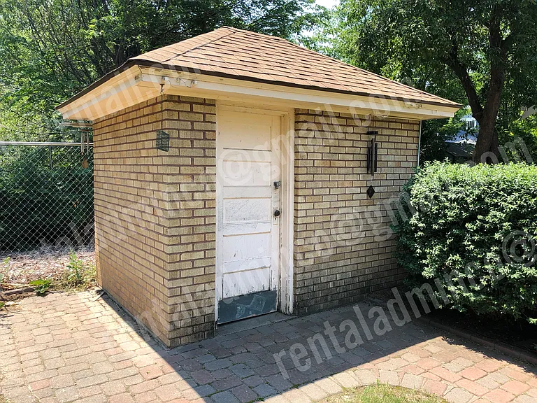 Storage shed for lawn care.