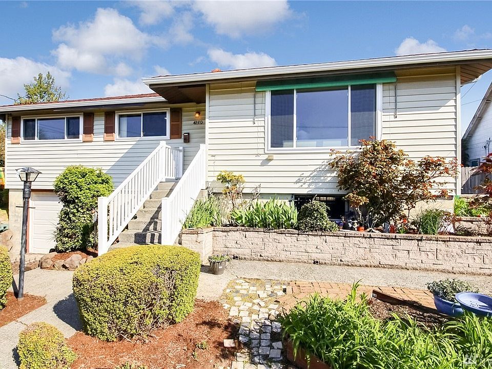 Wonderful mid century home lovingly owned by 1 family since 1958. This charming 1 story with a basement features 3 bedrooms, 1.75 baths plus a large bonus room. Private backyard with brick, wood fired pizza oven, 2 sheds, garden space all only minutes to the Othello light rail station