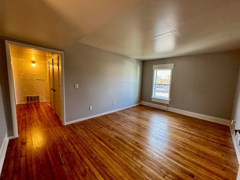 111 Baltimore St 2nd Fl. Rear - Living Room (refinished wood flooring)