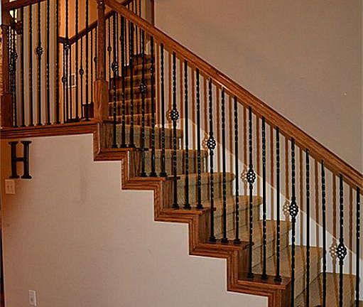 Rod iron grand stair case.