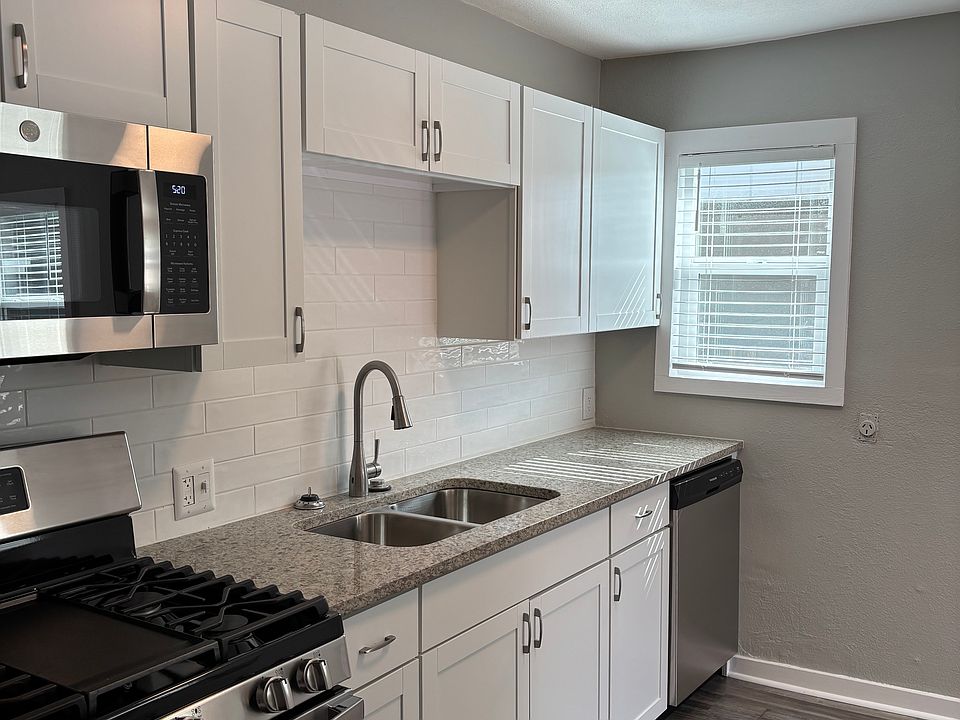 Stove, built-in microwave, hands-free faucet, and dishwasher