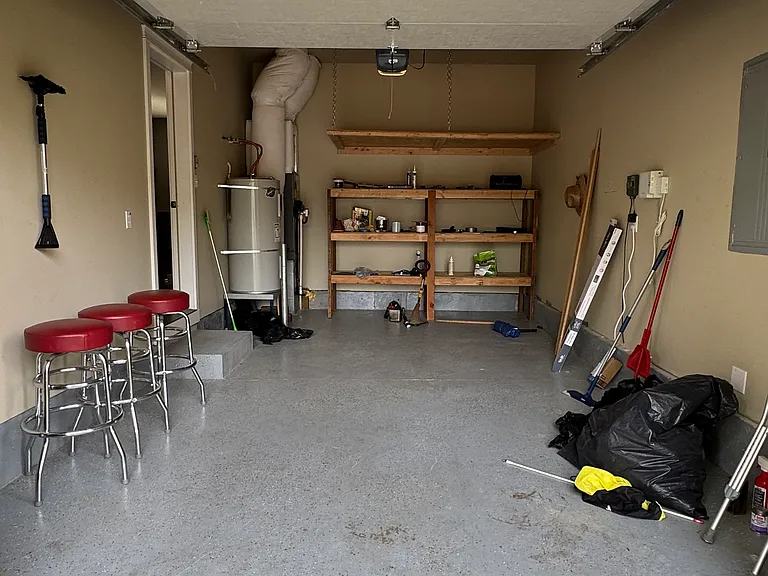 One car garage with shelves