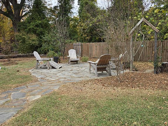 Firepit seating area, backyard.