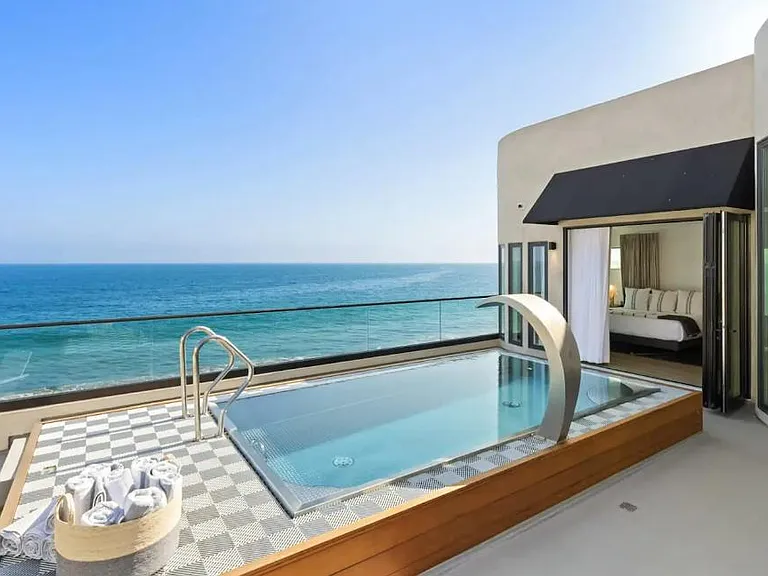 Unwind in the luxurious hot tub with refreshing ocean air.