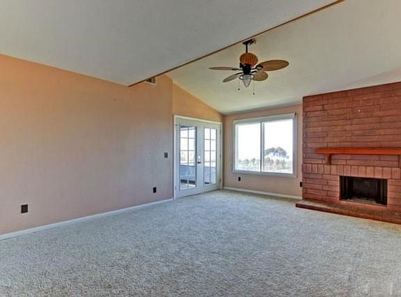 Carpet has been replaced with Wood.