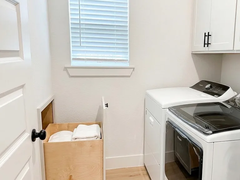 This hamper connects to the primary bedroom closet!