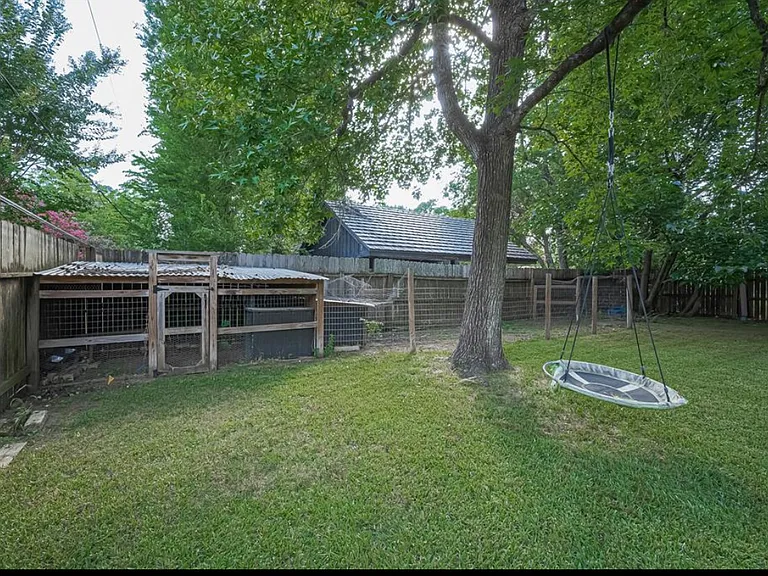 Backyard with view of chicken coop