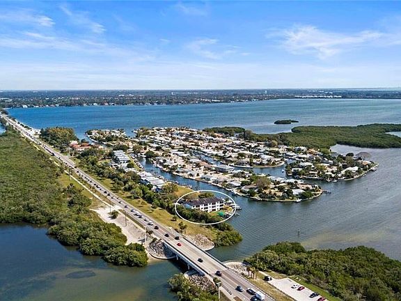 Aerial view of condo, Palma Sola Bay and Perico Bayou. Robinson Preserve is to your left
