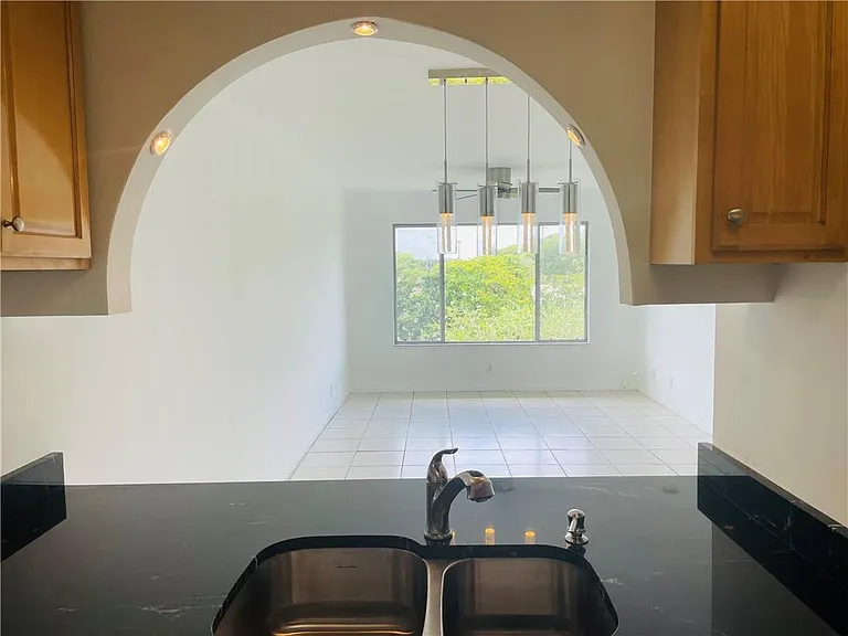 3247 NW 103rd Ter #308-C — Photo 2