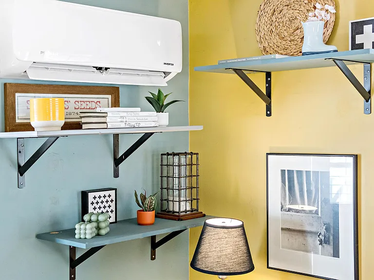 Mini split in living room provides both AC and heat
