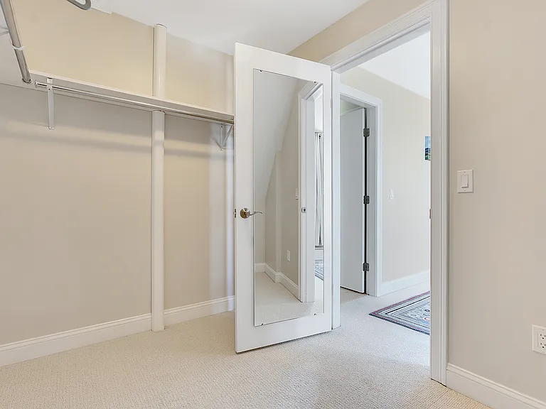 the master bedroom walk-in closet