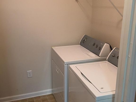 separate utility room with washer/dryer and plenty of storag