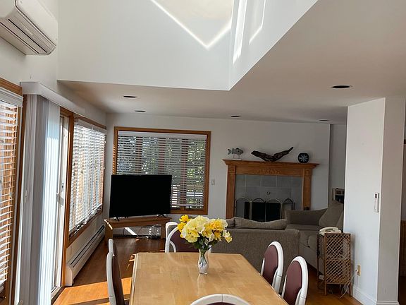 Dine by the double-sliding doors overlooking the water.