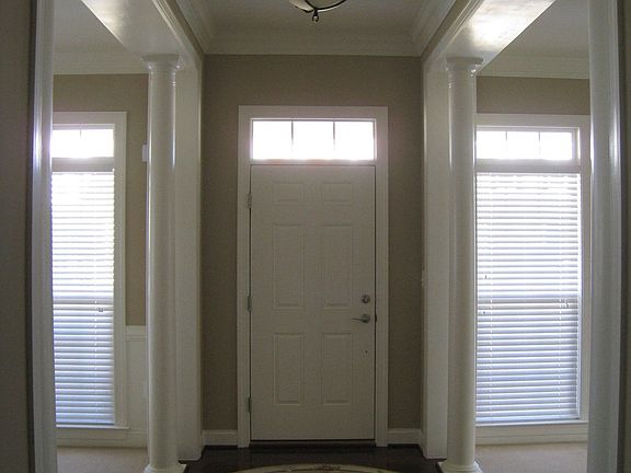 Soaring ceilings, lots of light, mouldings and tray ceilings