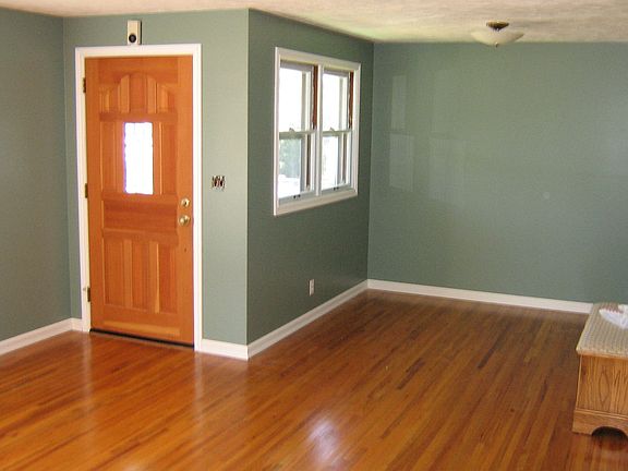 new baseboard window and door trim throughout