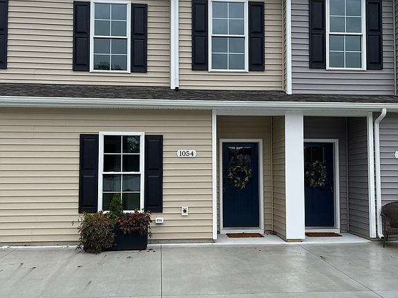 Front view of #1054 with 2 parking spaces