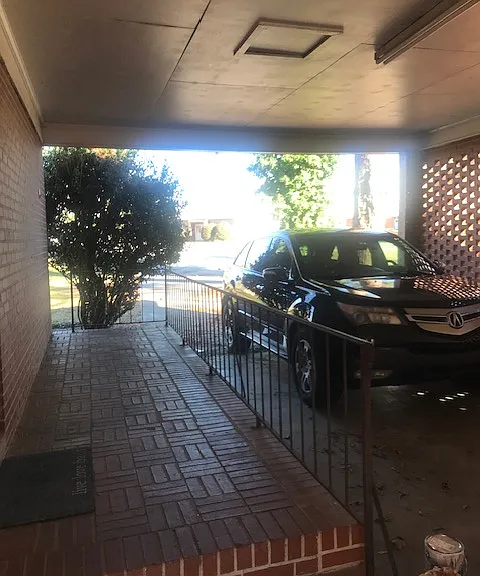 Garage. Enough space to fit one car inside and 3-4 cars outside