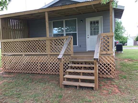 Front of house with covered porch