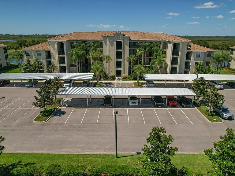 7015 River Hammock Dr #208 — Photo 1