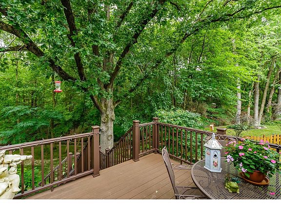 Composite Deck Overlooking the Wooded Back Yard