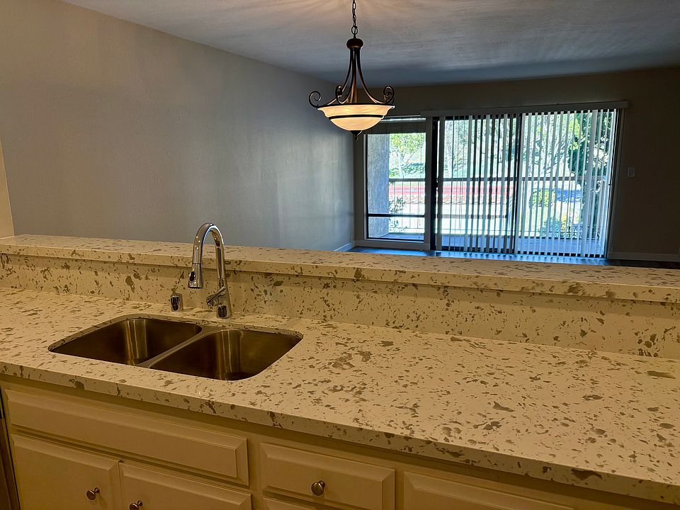 Living room area visible from kitchen