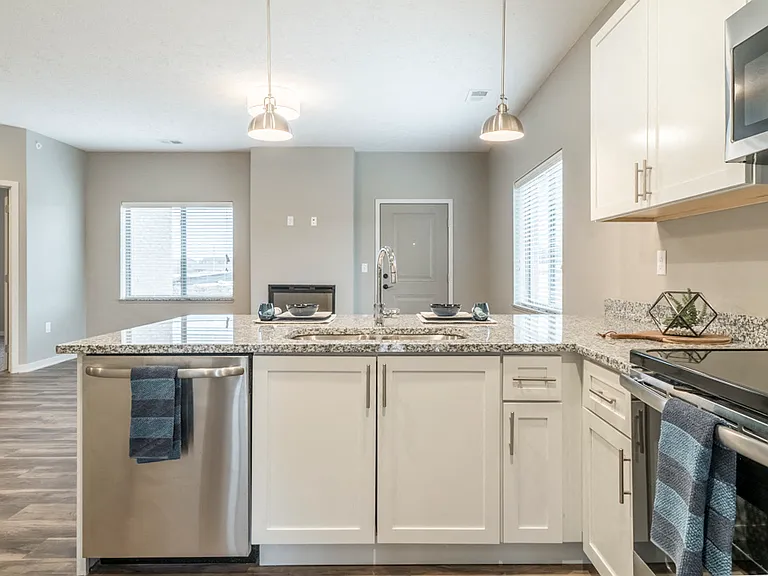 Our upscale kitchens feature modern hardware, granite countertops and stainless-steel appliances.